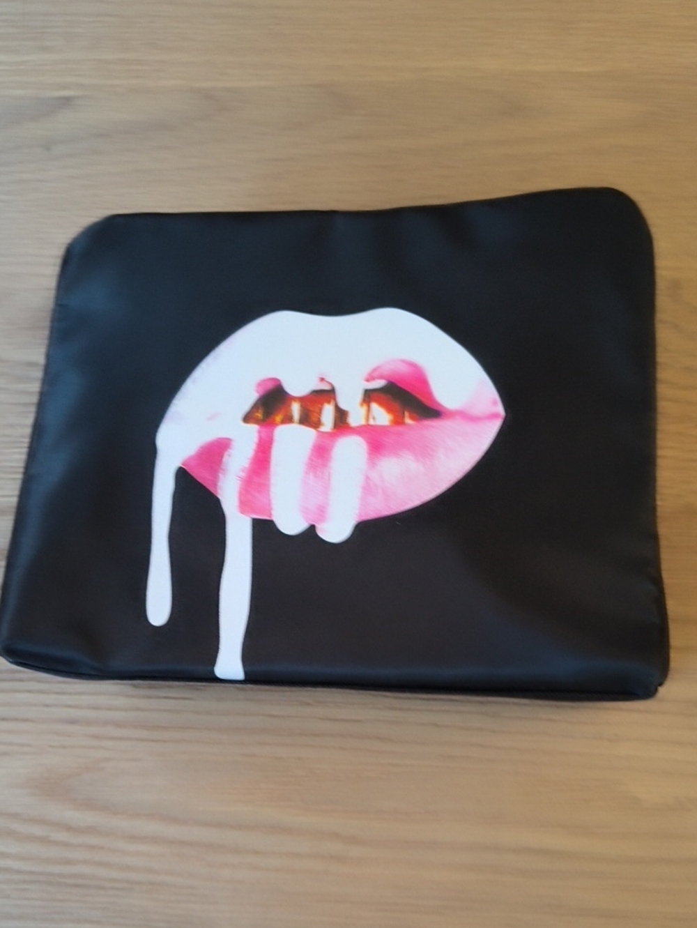 Kylie Cosmetics Black Pouch with Pink Drip Lip Graphic and Gold Accent